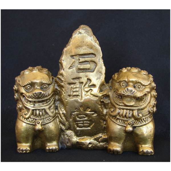 Brass Fu Dogs Sitting Beside Mountain