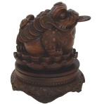 Money Toad Statue Sitting on Coins and Lotus